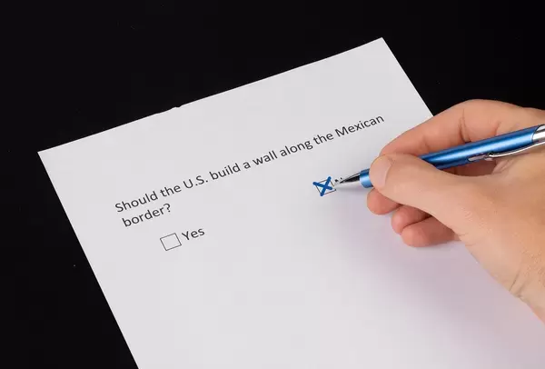 Men answering NO to the question if U.S. should build a wall along Mexican border