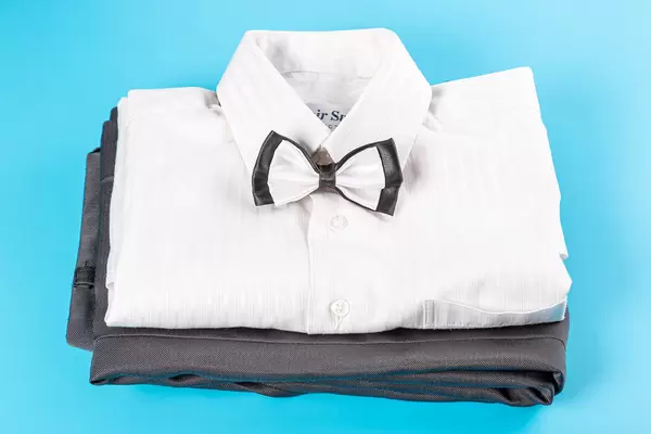 Men's children's clothing on a blue background, classic style