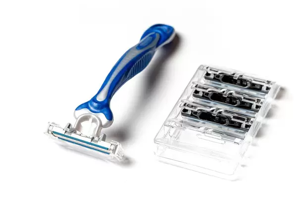 Men's razor with blades on a white background (Flip 2020)