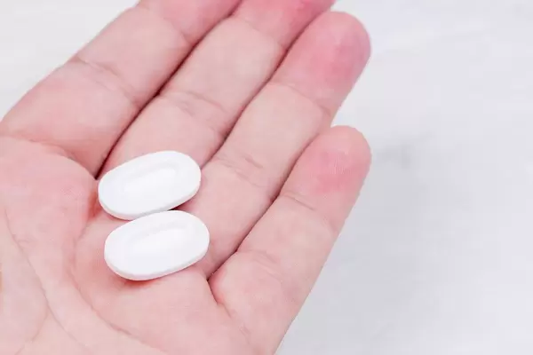 Menthol Mints in the hand with copy space