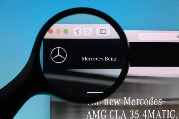 Mercedes-Benz logo under magnifying glass
