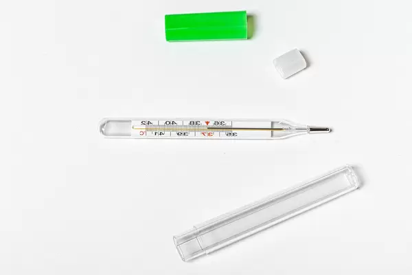 Mercury thermometer on white background (Flip 2019)