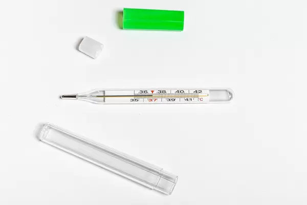 Mercury thermometer on white background