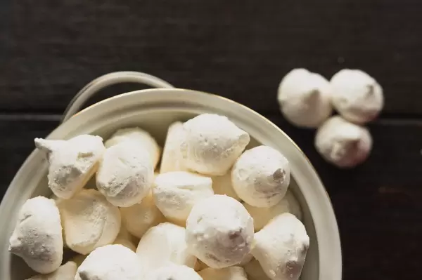 Meringue cookies on a white bowl