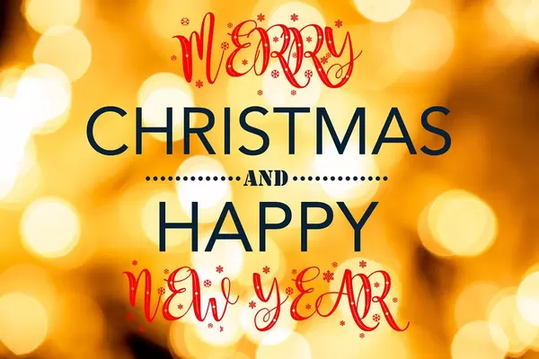 Merry christmas and new year wishes on golden bokeh