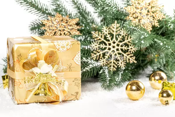 Merry christmas background with golden gift and decor