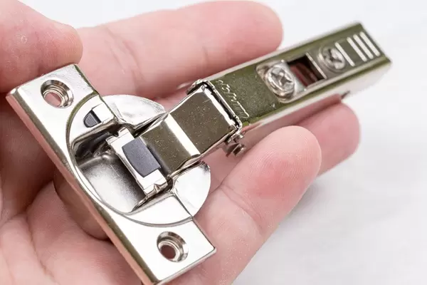 Metal Blum Hinges with slowmotion system on the hand
