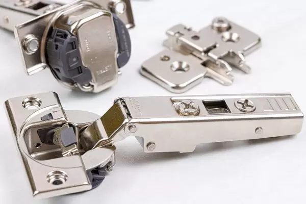 Metal Blum Hinges with slowmotion system ready for mounting