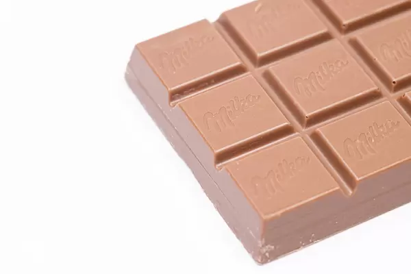 Milka Chocolate above white background
