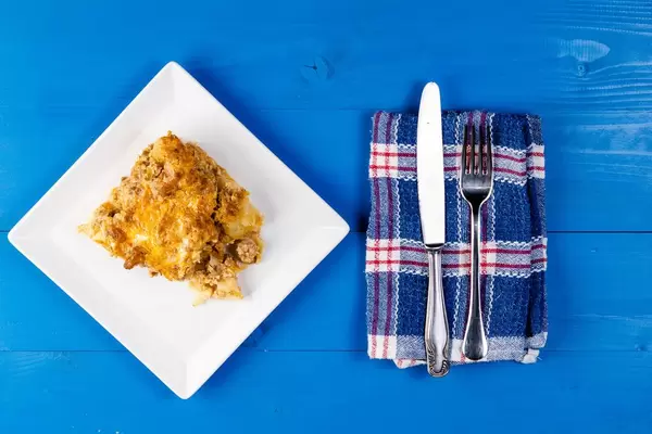 Minced Meat and Potatoes homemade pie on the square plate (Flip 2019)