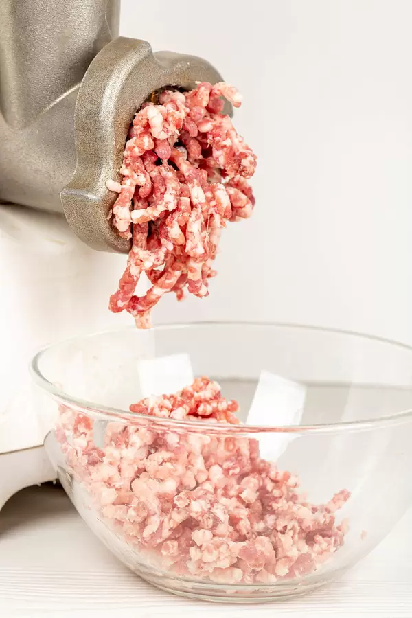 Mincer machine with fresh chopped meat