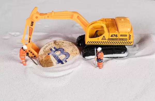 Miners and excavator diggit Bitcoin