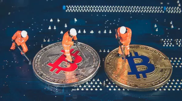 Miners with silver and golden Bitcoin