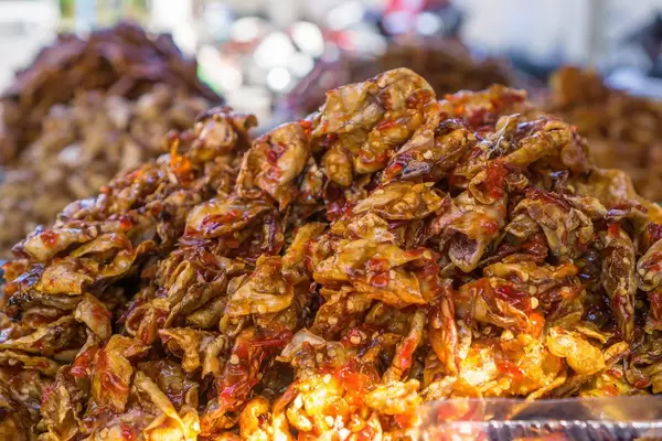 Mini Dried Crab Snack with Seasame at a Fish Market in Vung Tau