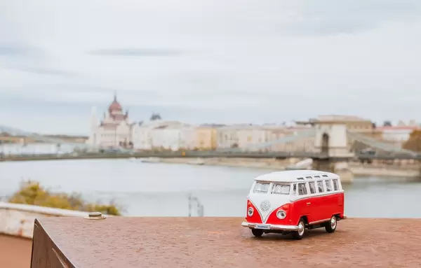 Mini toy car in front of Chain Bridge in Budapest