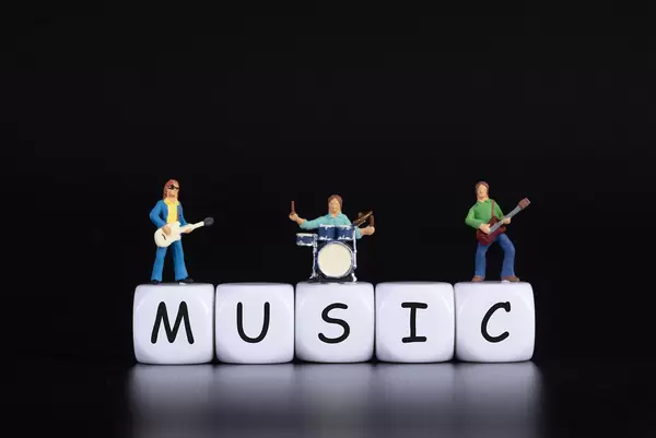 Miniature band with Music text