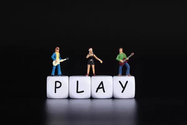 Miniature band with Play text