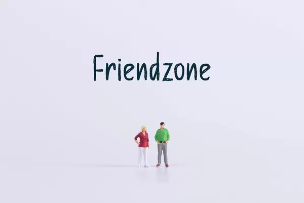 Miniature man and women with Friendzone text