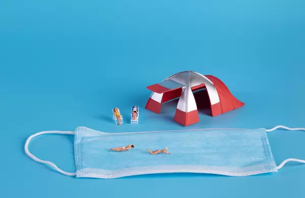 Miniature people on vacation during Coronavirus pandemic