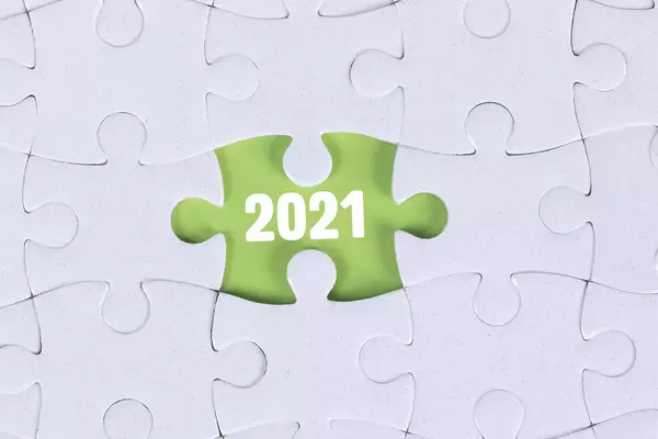 Missing puzzle piece and 2021 text