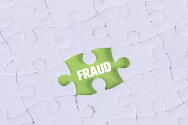 Missing puzzle piece with Fraud text