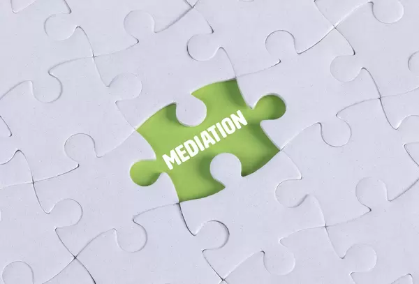 Missing puzzle piece with Mediation text