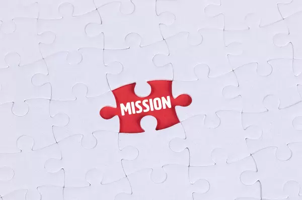 Missing puzzle piece with Mission text