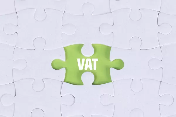 Missing puzzle piece with VAT text