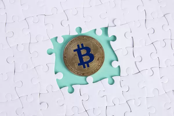 Missing puzzle pieces and golden Bitcoin coin