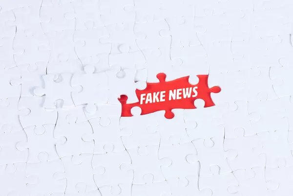 Missing puzzle pieces with a Fake News text