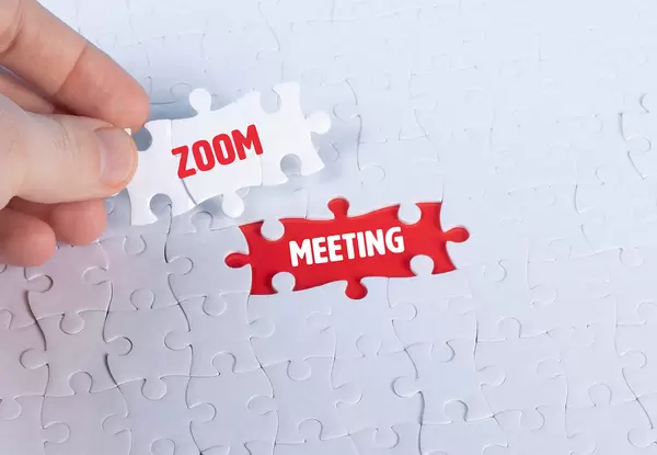 Missing puzzle pieces with a Zoom Meeting text