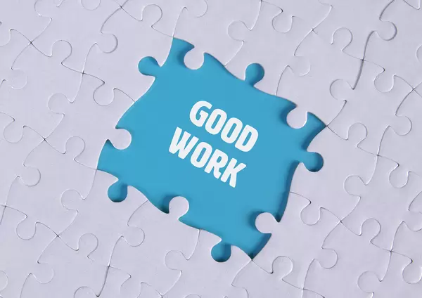 Missing puzzle pieces with Good Work text