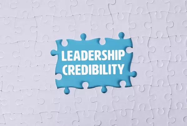 Missing puzzle pieces with Leadership Credibility text