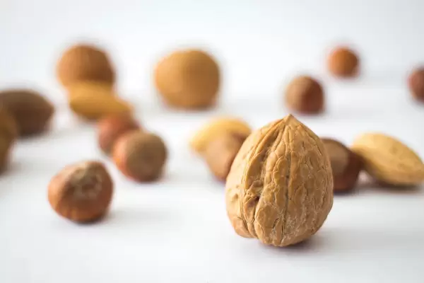 Mix a Nuts with Walnut Close Up in Front