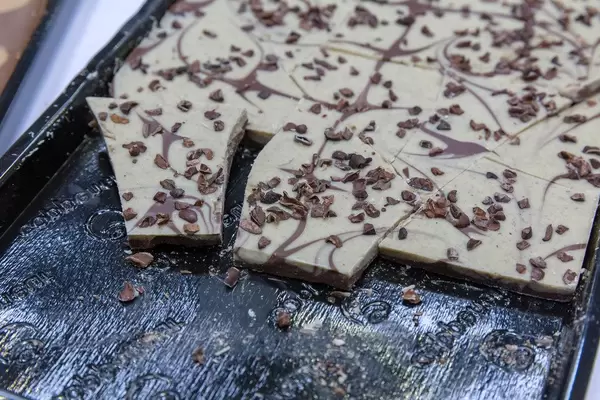 Mixed vanille and cocoa blocks on black tray at the BarCamp in Bonn