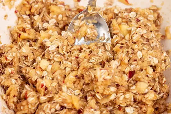 Mixture of Cereals and Apples ready for baking cakes