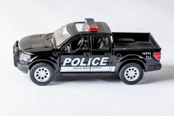 Model of a black police car Ford
