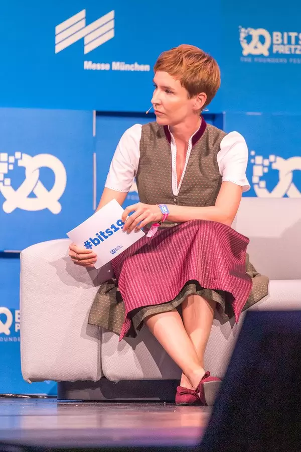 Moderator Britta Weddeling's wearing a dirndl on the stage of #bits19 during the Oktoberfest in Munich