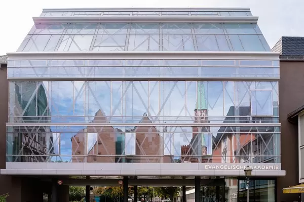 Modern glass building of evangelic academy in Frankfurt, Germany