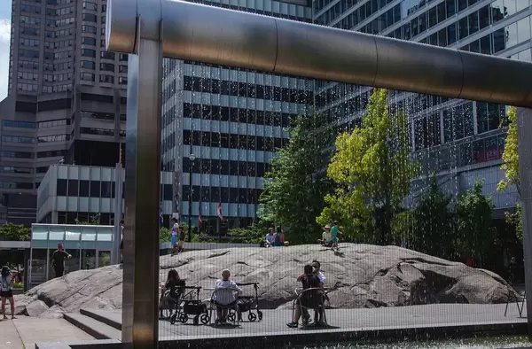 Modern Water Fountain with people in the Background  (Flip 2019)