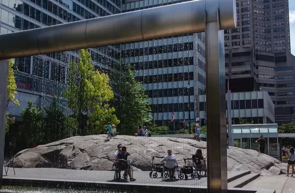 Modern Water Fountain with people in the Background