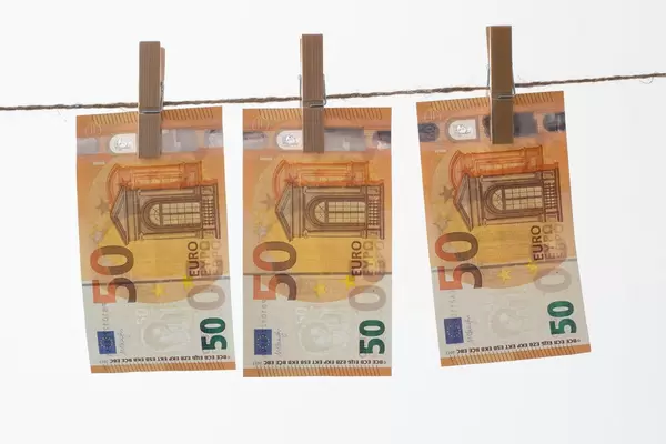 Money drying on the rope