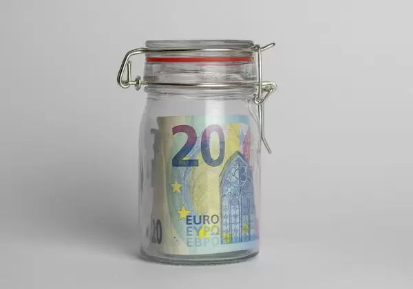Money jar containing 20 Euros