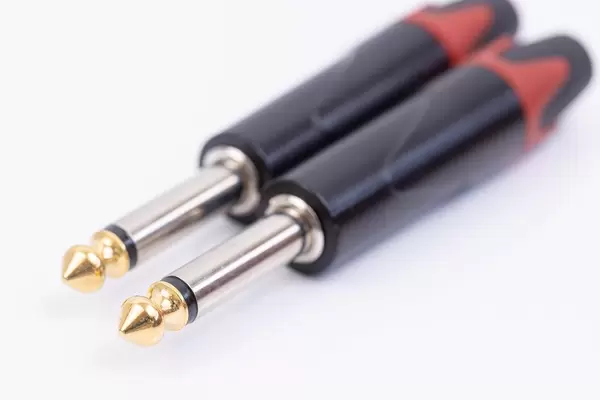 Mono Jack connectors 1/4 isolated above white background