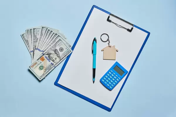 Mortgage calculator - House, money and document.