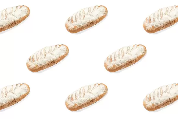 Mosaic of Italian sourdough bread on white background