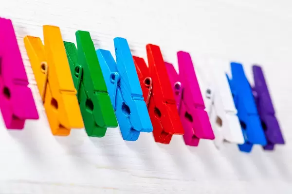 Multi-colored wooden clothespins for clothes