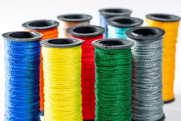Multicolor sewing threads background