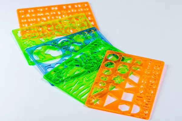 Multicolored rulers on a white background