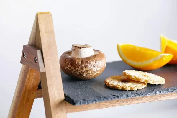 Mushroom with sweets and fruits on display